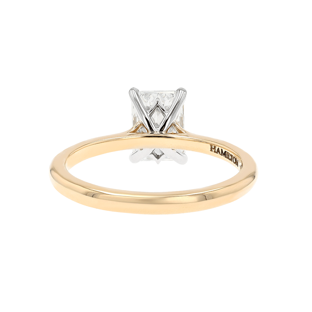 Platinum and 18k Yellow Gold Radiant Solitaire Ring
