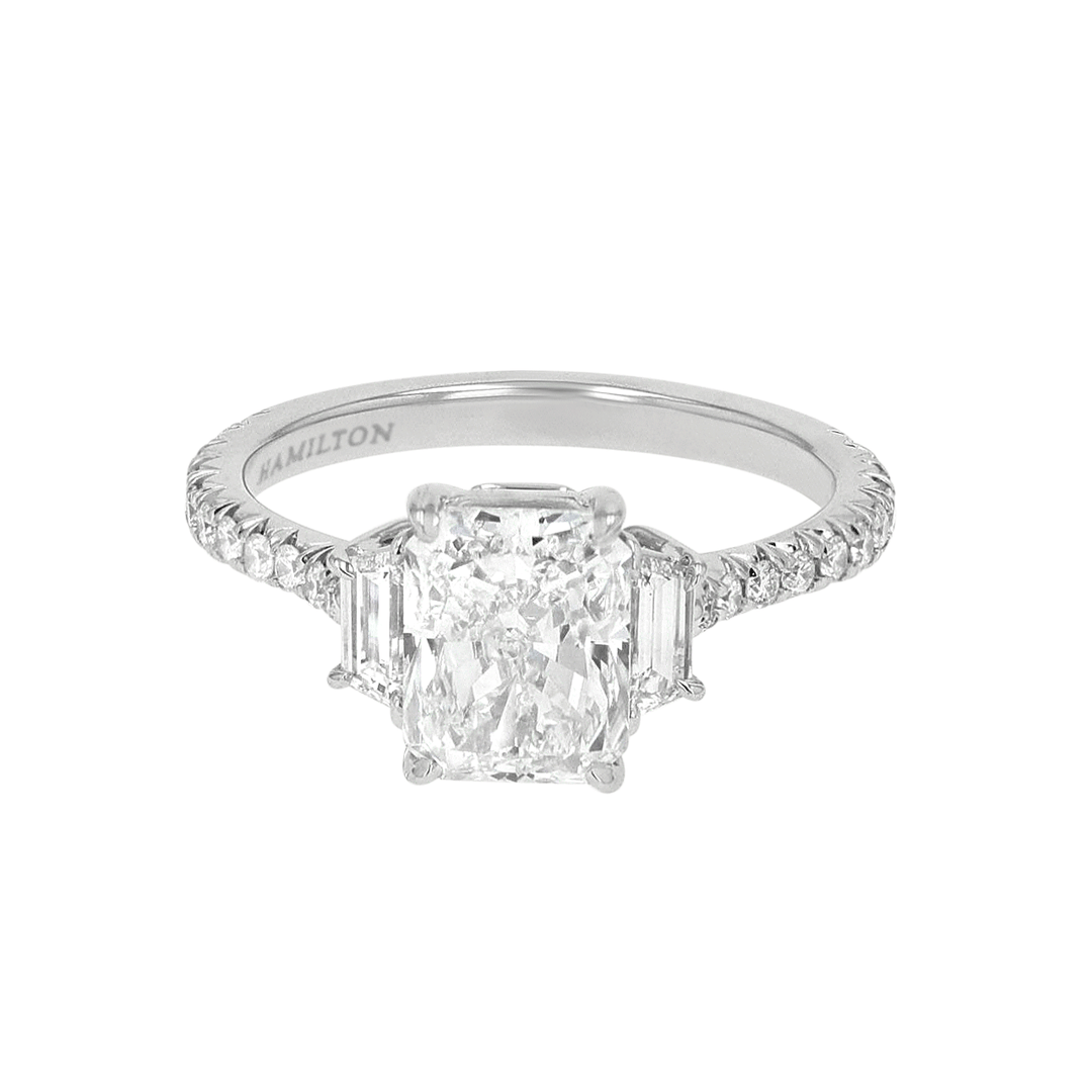 Platinum Radiant and Trapezoid Three Stone Ring