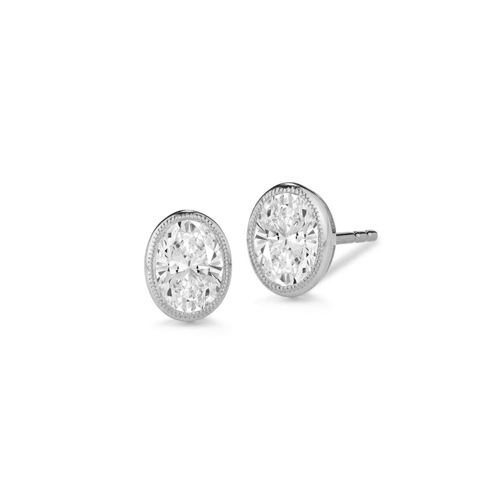 18k White Gold and Oval Diamond .64 Total Weight Bezel Studs