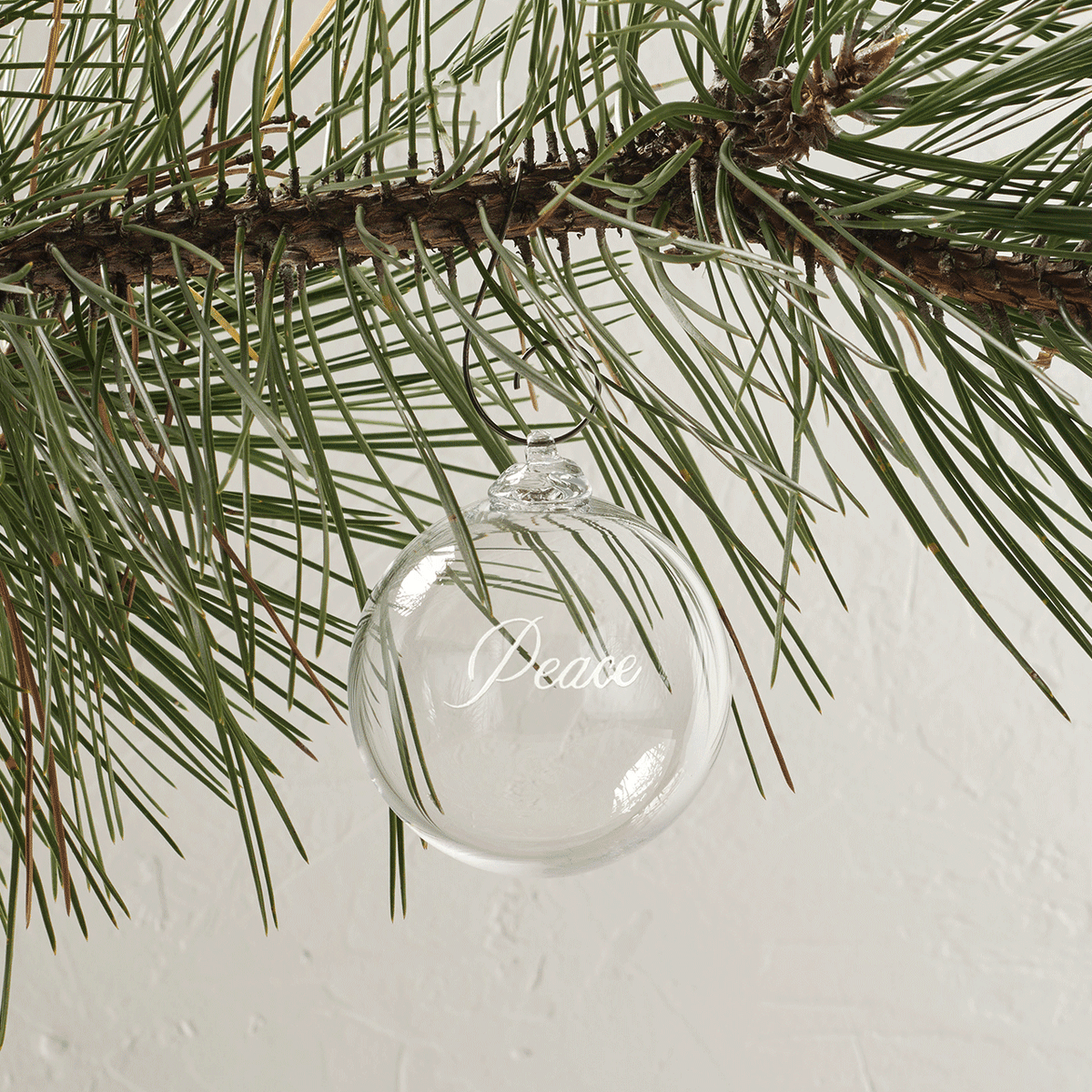 Simon Pearce Peace Ornament