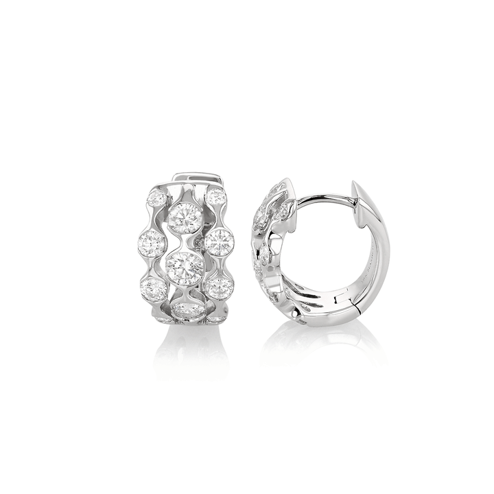 Wave Three Row 18k White Gold and 1.20 Total Weight Diamond Huggie Earrings