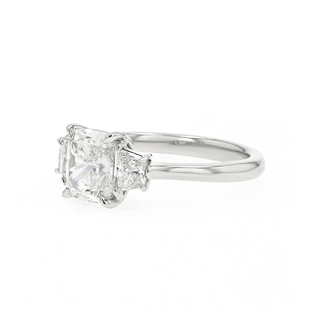 Platinum and 1.71 Total Weight Cushion Cut Diamond Three Stone Ring