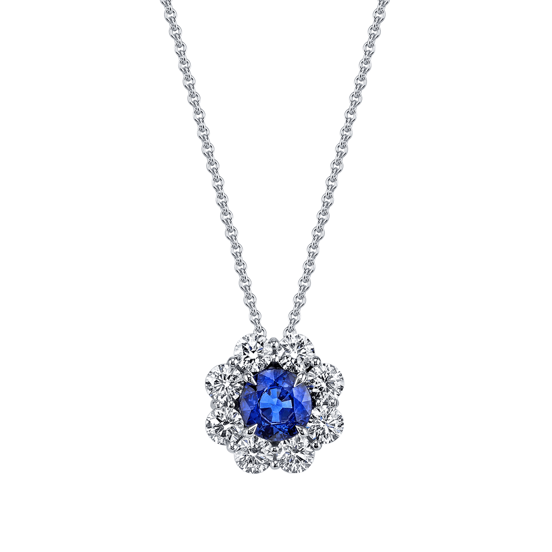 Platinum Sapphire .64 Total Weight and Diamond Pendant