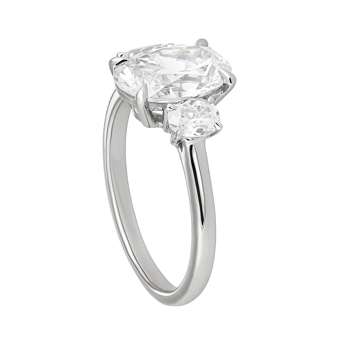 Platinum and 1.50 Total Weight Oval Diamond Three Stone Ring
