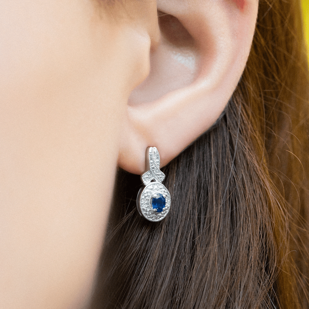 Sterling Silver Sapphire and .05 Total Weight Earrings