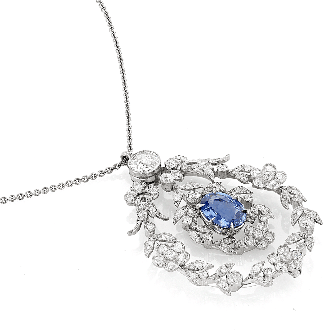 Platinum Oval Sapphire 3.11 Total Weight and Diamond Pendant