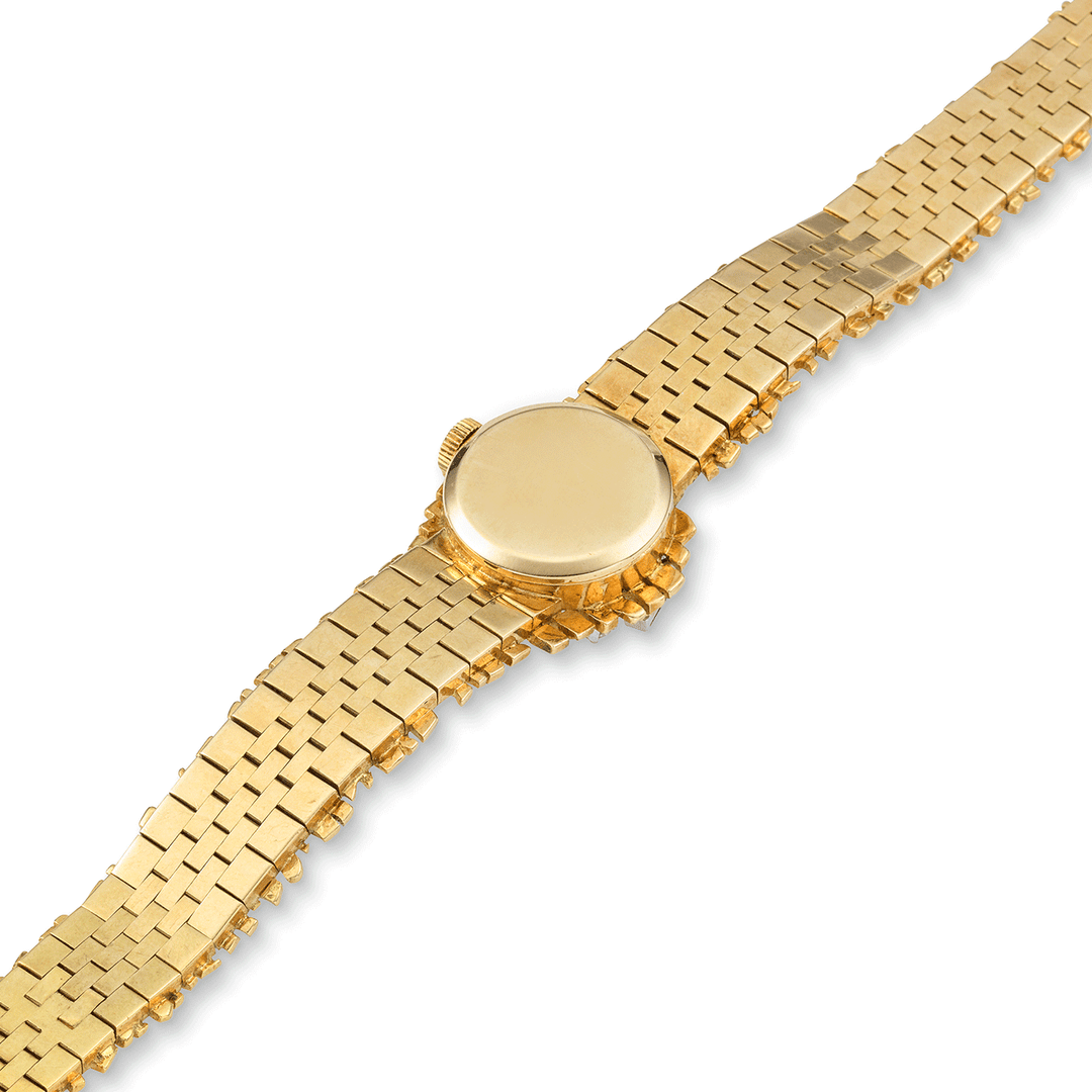 PATEK PHILIPPE YELLOW GOLD, DIAMOND, SAPPHIRE AND RUBY BRACELET WATCH, REF. 3289/24J