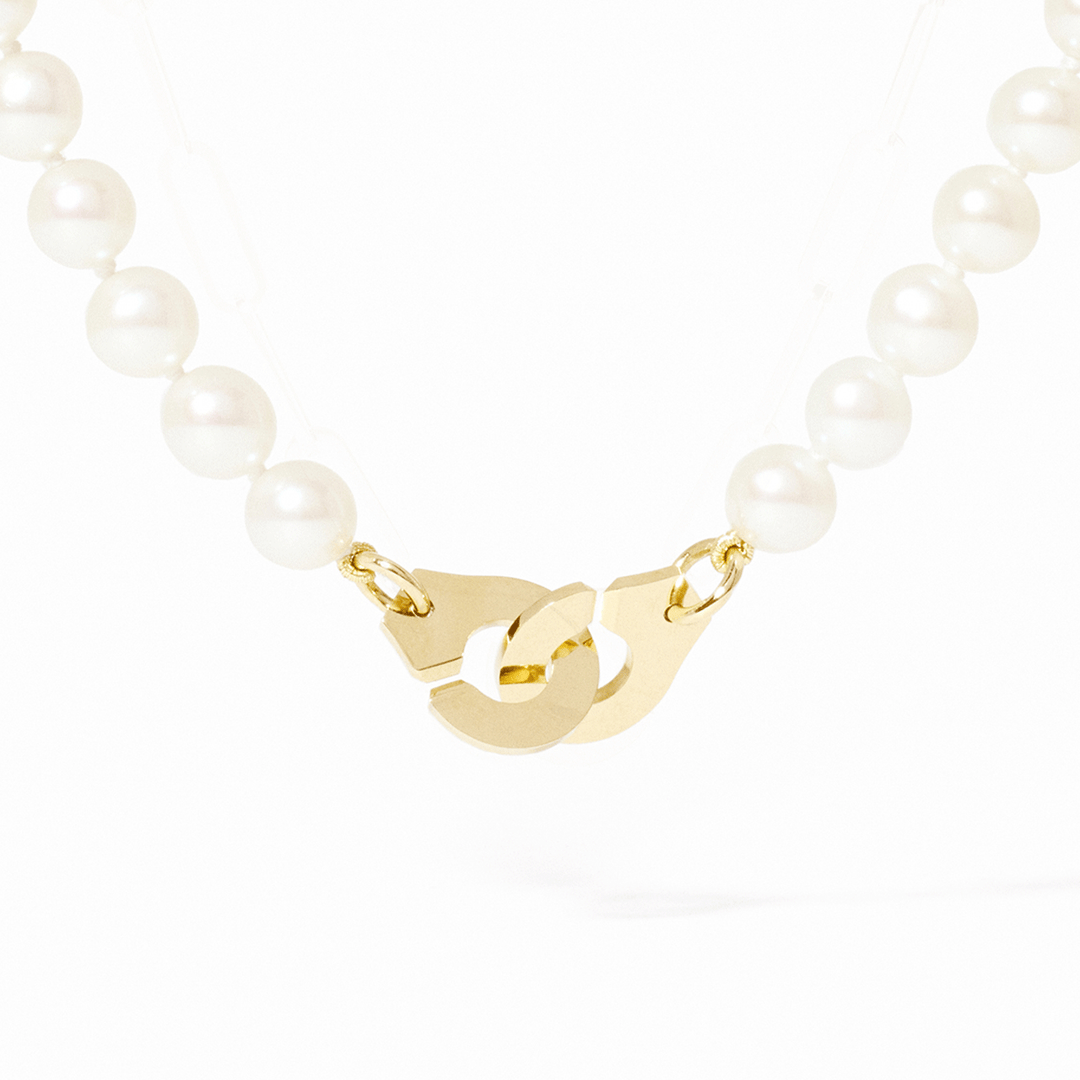 Dinh Van Menottes R10 18K Yellow Gold Pearl Necklace