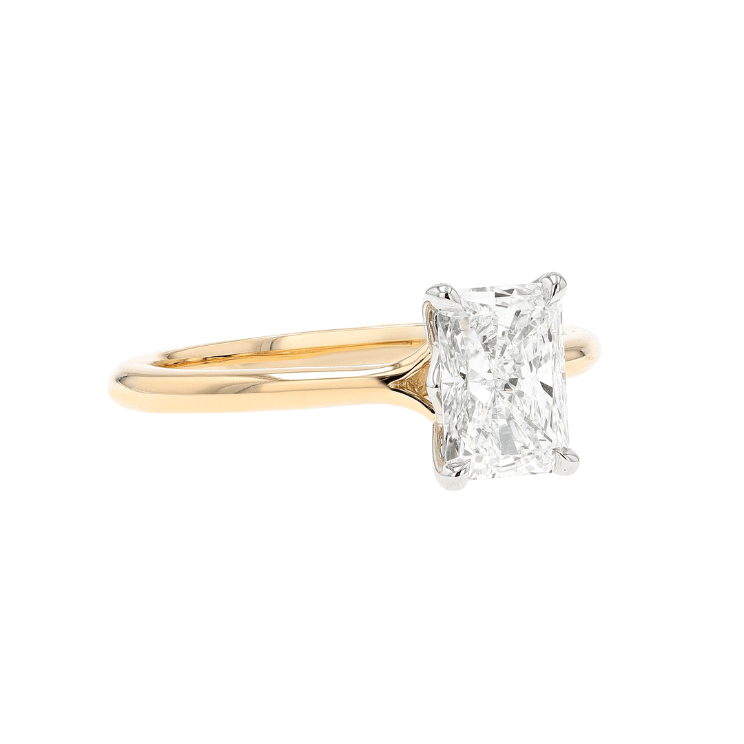 Platinum and 18k Yellow Gold Radiant Solitaire Ring
