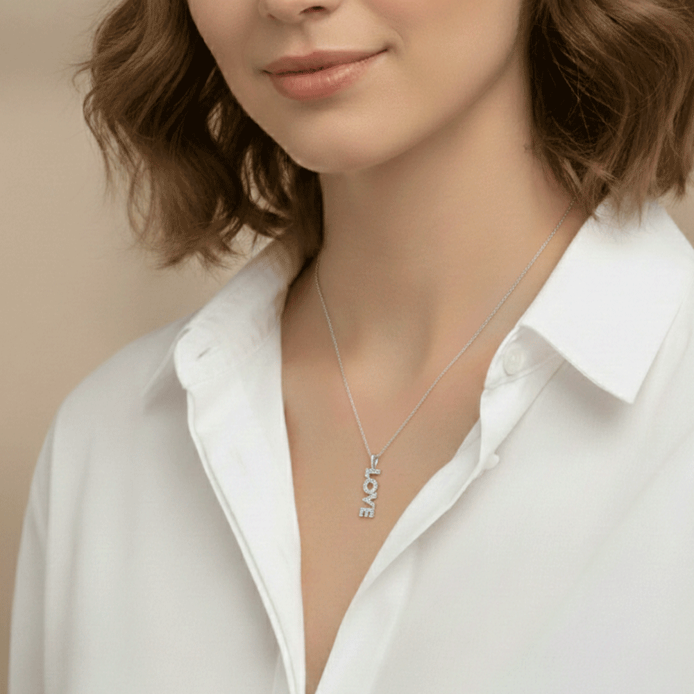 14k White Gold and .27 Total Weight Diamond Love Charm