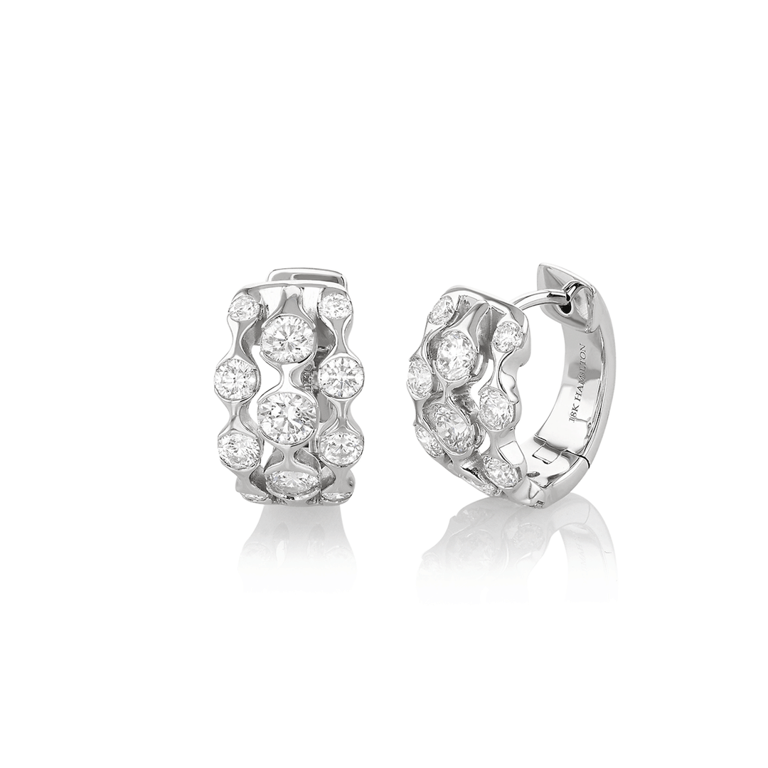 Wave Three Row 18k White Gold and 1.20 Total Weight Diamond Huggie Earrings