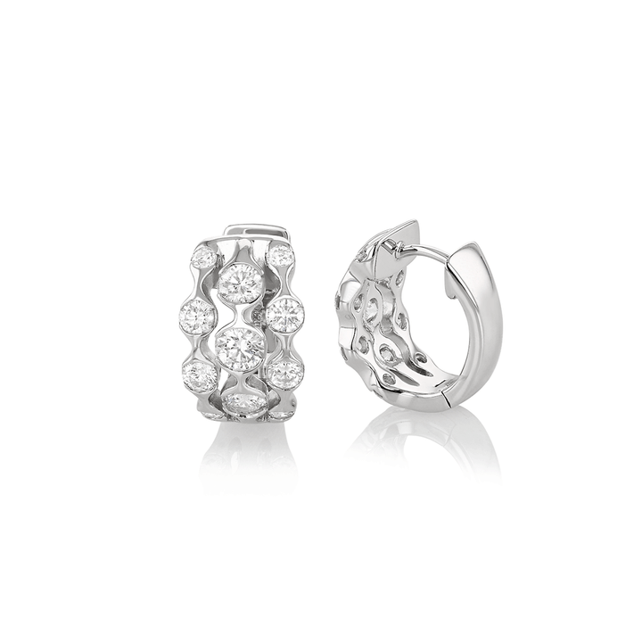 Wave Three Row 18k White Gold and 1.20 Total Weight Diamond Huggie Earrings