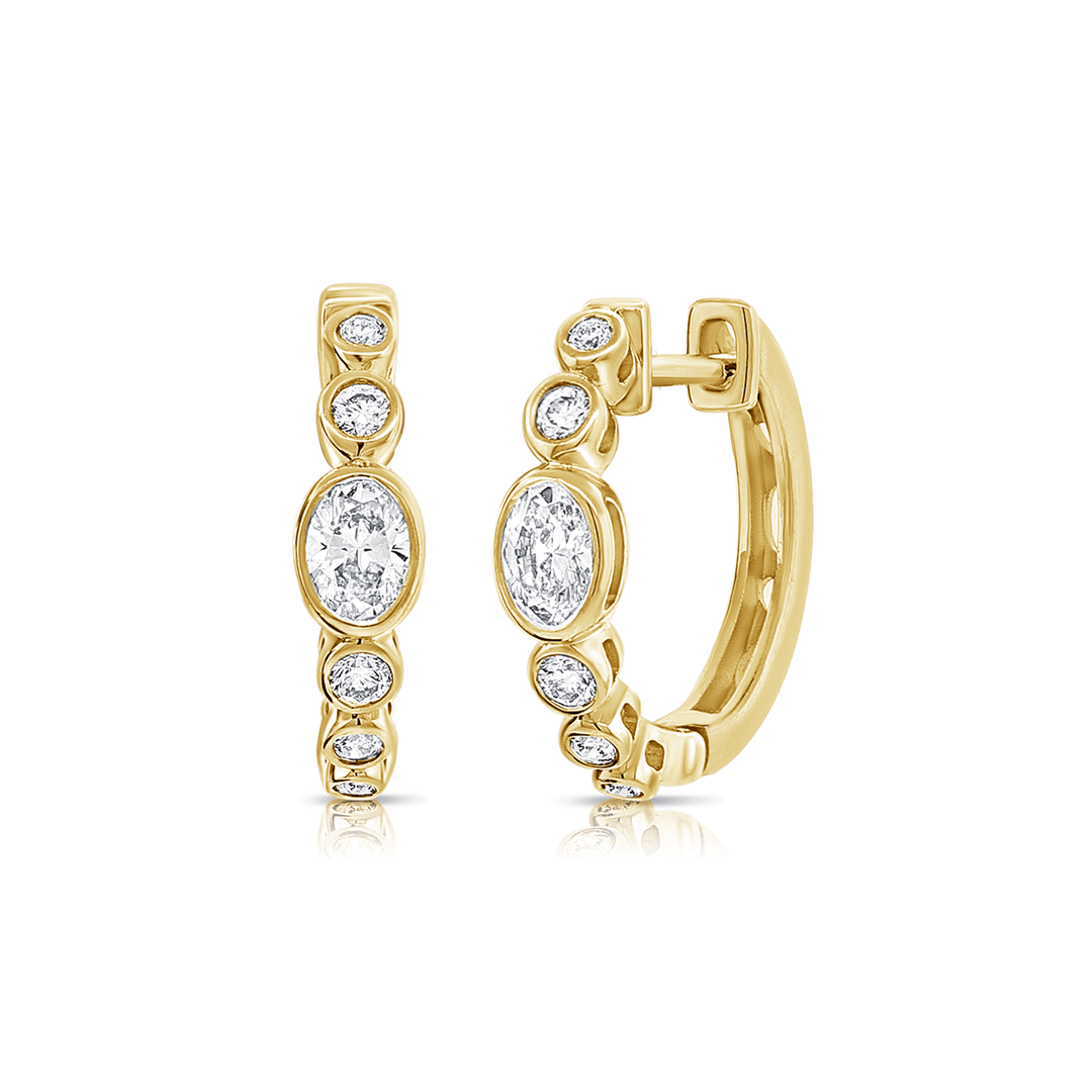 14k Yellow Gold and 0.56 Total Weight Oval Shape Diamond Huggies