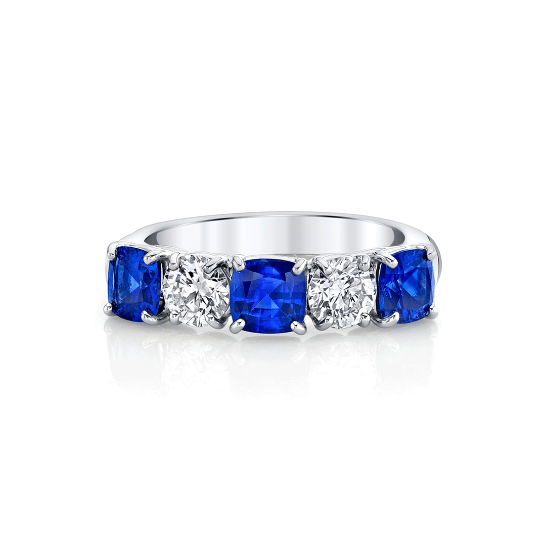 Platinum Cushion Cut Sapphire 1.73 Total Weight and Diamond Band