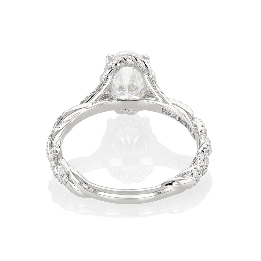 Platinum and 1.50 Total Weight Oval Cut Diamond Full Twist Engagement Ring