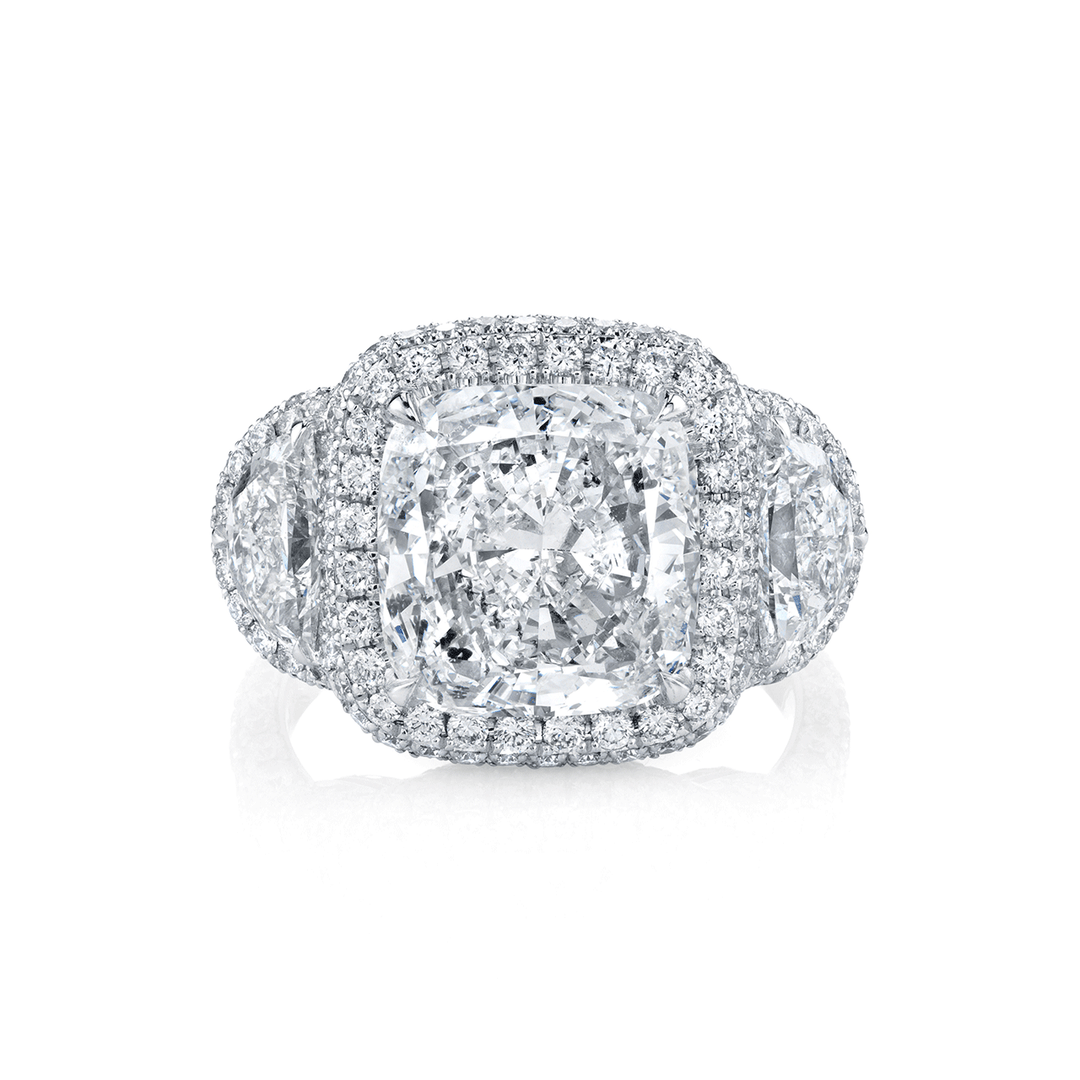 Platinum and 4.50 Total Weight Cushion Three Stone Halo Ring